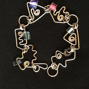 Silver and gold beaded bracelet